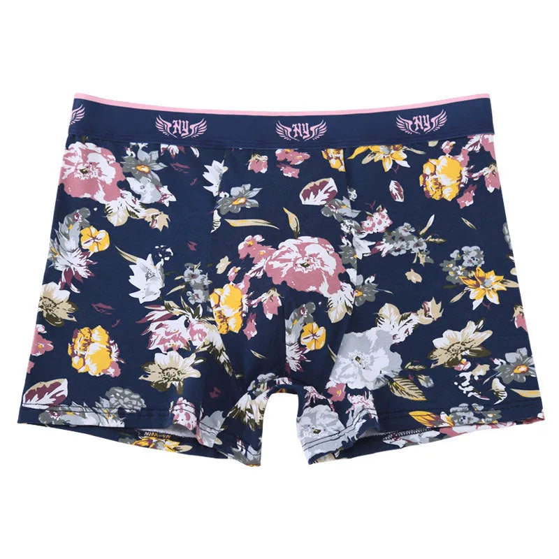 Purified cotton men's boxer shorts in a floral pattern, showing mid-waist fit and U-shaped design.