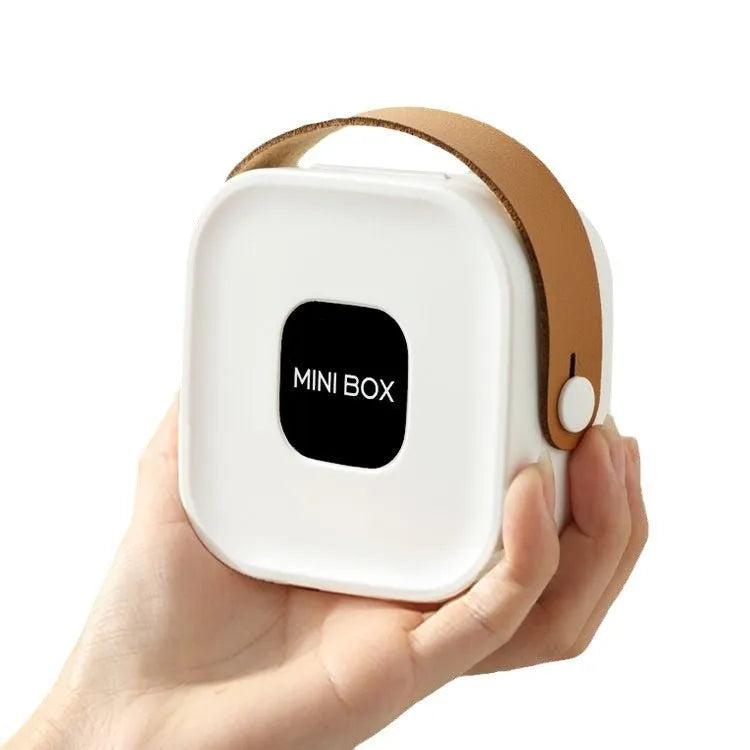Medium-sized polypropylene storage box with a lid for organising cables and a Bluetooth headset.