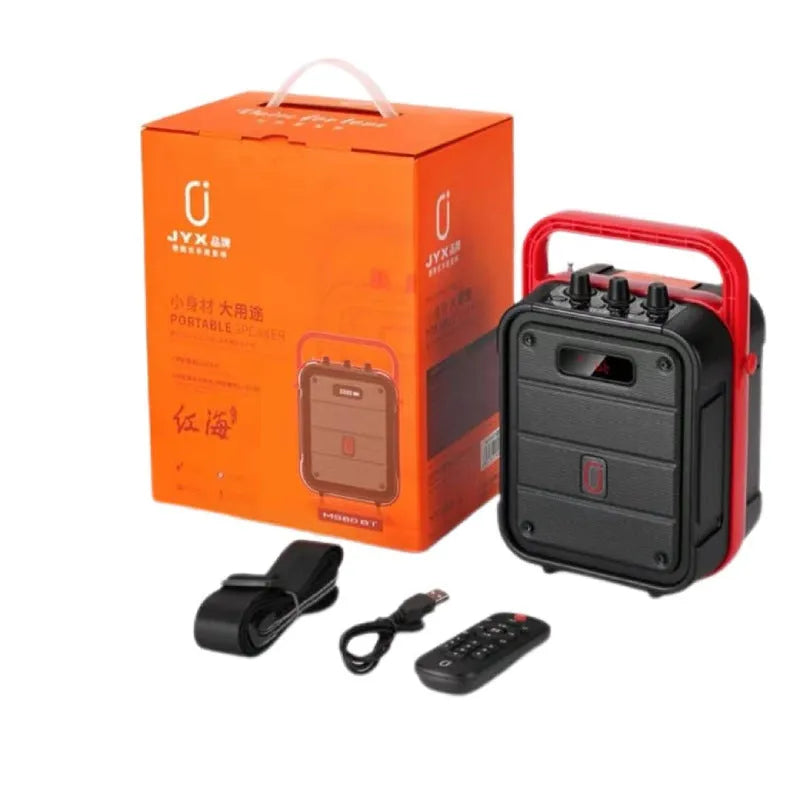 MS62AI portable Bluetooth speaker with wireless microphone on a table showing knob controls.