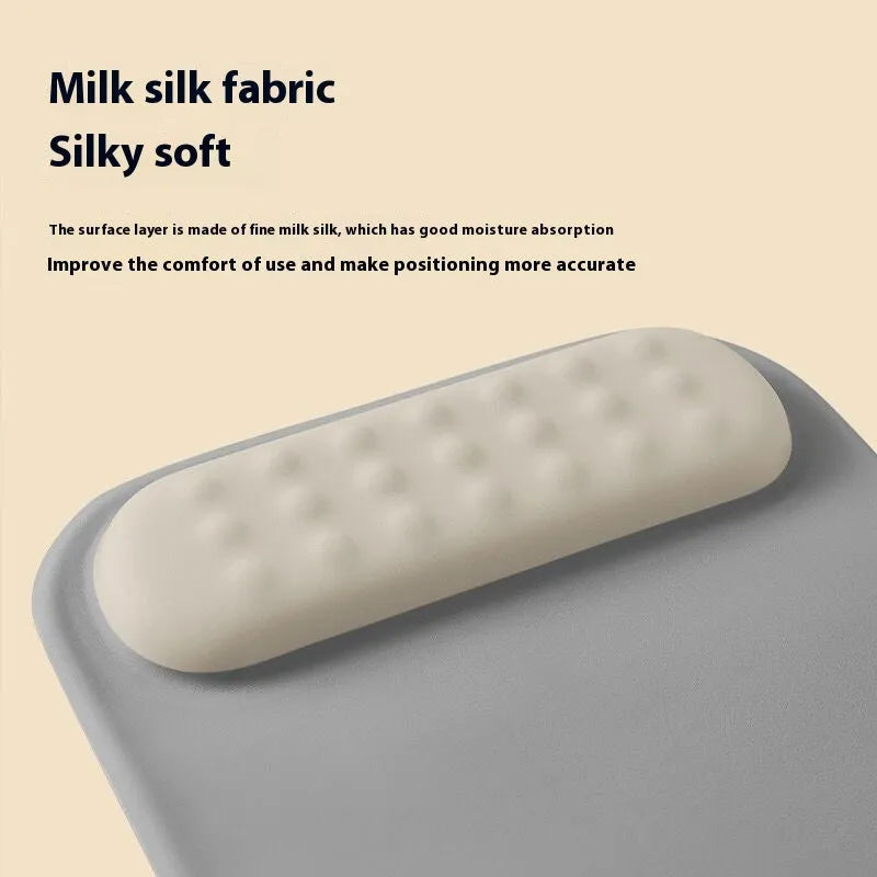 Ergonomic cloth silicone mouse pad with built-in wrist rest in a choice of colours.
