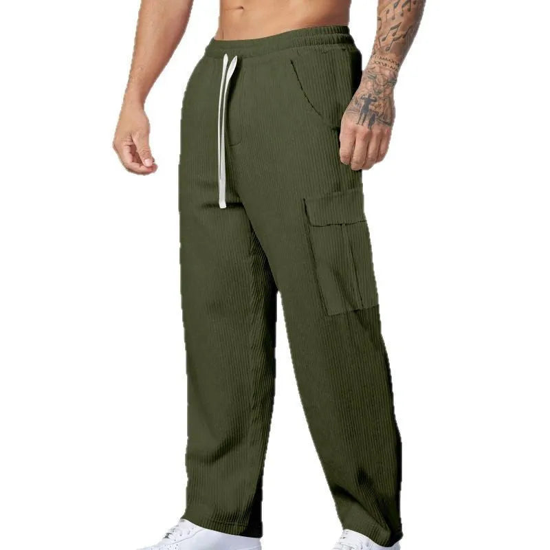 Men's straight leg corduroy cargo trousers in army green with a drawstring waist and loose wide-leg fit.