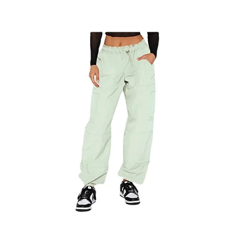 Loose fit straight-leg multi-pocket cargo casual pants in polyester fabric.