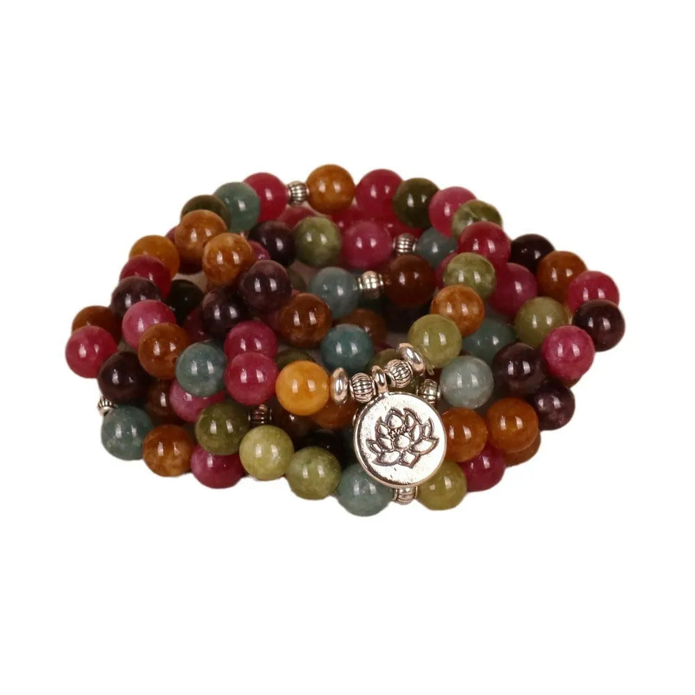 Multi-strand tourmaline bead bracelet with lotus clasp showing 108 beads on alloy chain