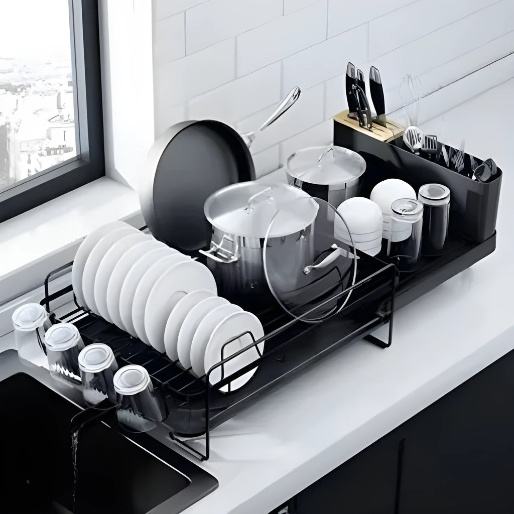Retractable carbon steel kitchen dish drain rack for knives and forks in folded and extended positions.