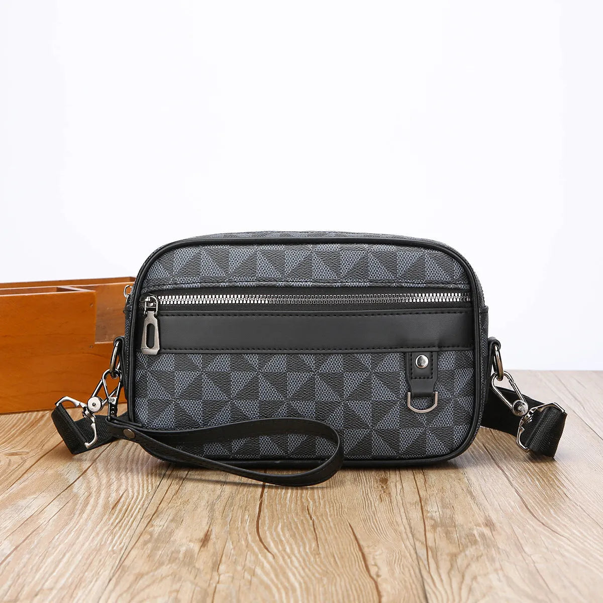 Men's casual shoulder messenger bag in black PU with geometric pattern, large capacity, and top handle