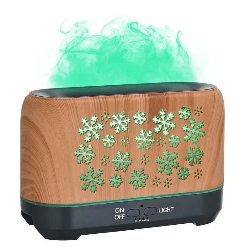 Wood grain snowflake pattern humidifier with colourful flame mist effect on desktop