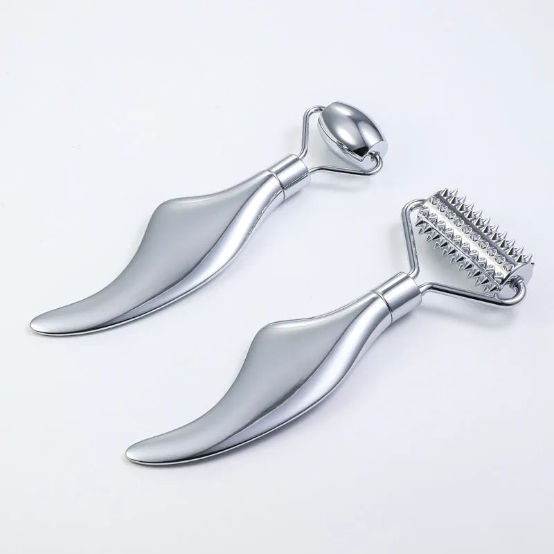 Stainless steel heart-shaped massage board with roller and scraping plate for facial care