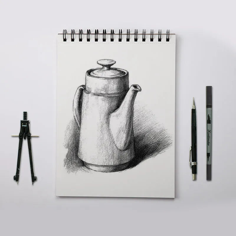 A4 coil bound drawing book with blank pages, open flat on a desk
