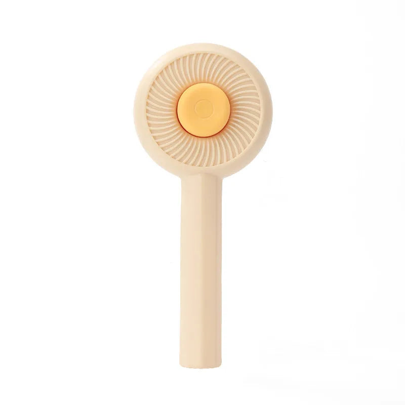 Blue pet grooming brush with angled metal bristles and self-cleaning button for cats and dogs