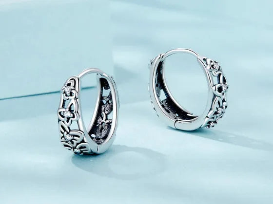 Sterling silver butterfly stud earrings with zircon accents and oxidised finish, 14mm height