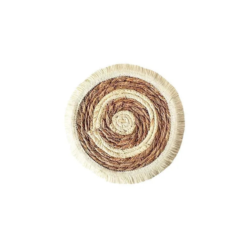 Round natural papyrus straw placemat with tassel detailing in 25cm, 30cm, 33cm, and 38cm sizes.