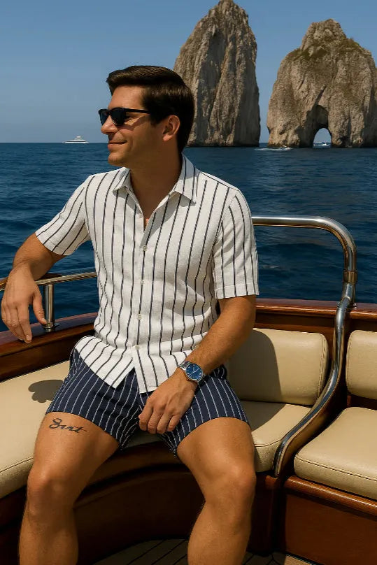 Men's blue beach shirt and shorts set in four-sided elastic fabric shown on model