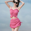 Women's milk silk split bikini swimsuit in solid colour, shown in pitaya red, yellow, or black.