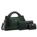 Square black women's crossbody bag with crocodile pattern texture and a single shoulder strap.