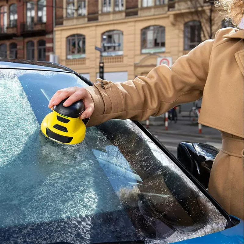 Cordless electric snow scraper in yellow ABS plastic with charging cable, measuring 118mm tall