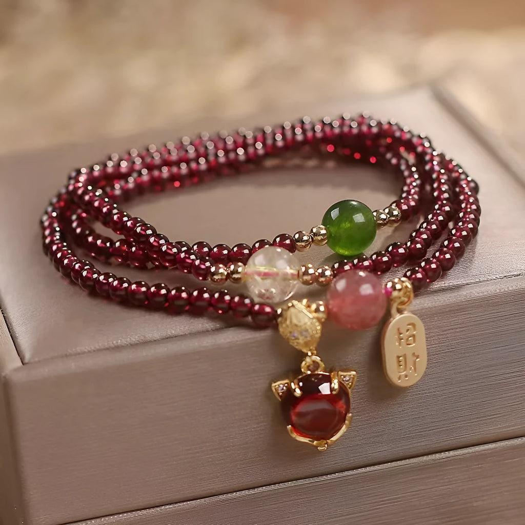 Natural crystal fox bracelet for women with purplish red garnet pendant on adjustable rope