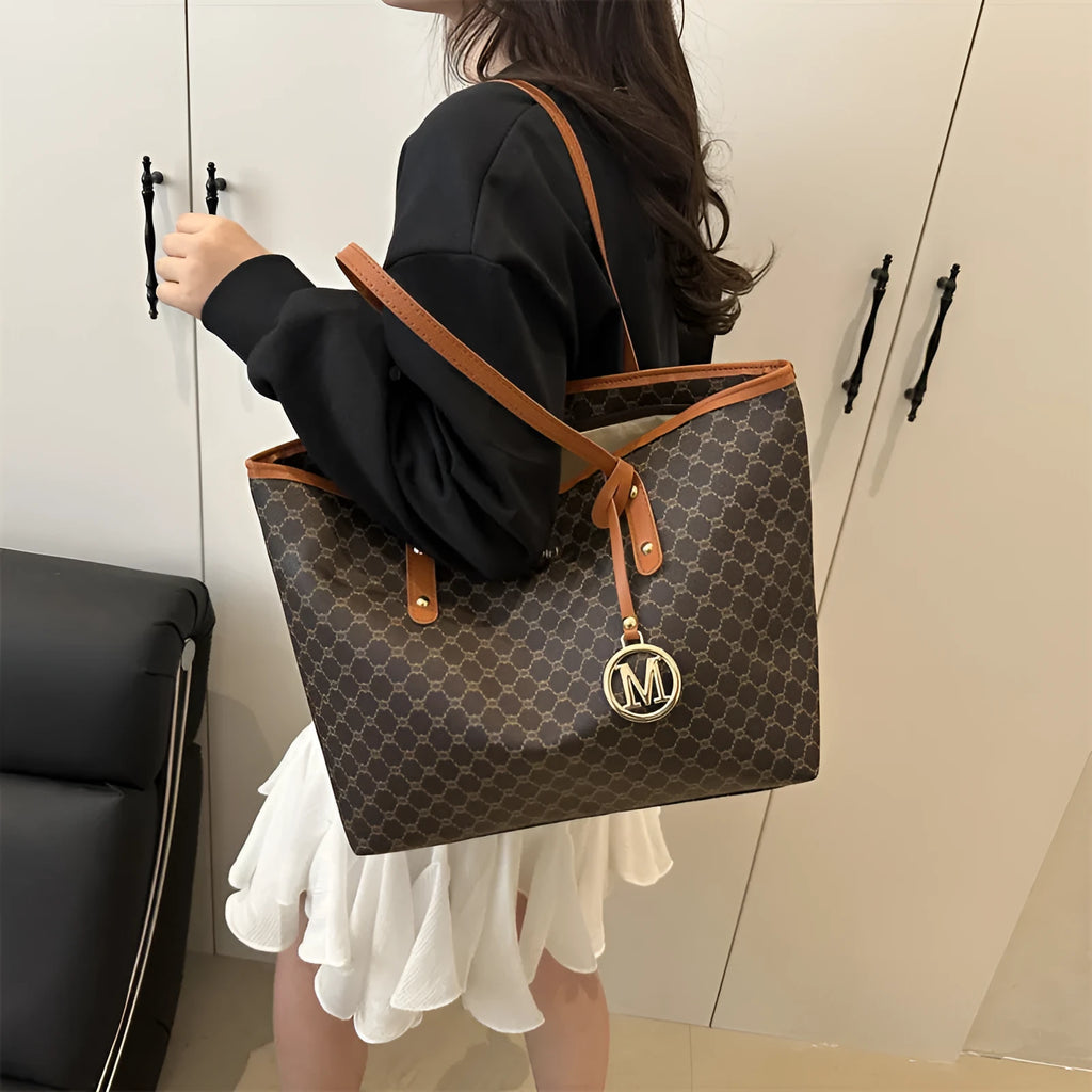 Western style black PU shoulder bag with sewing thread detailing and adjustable strap.