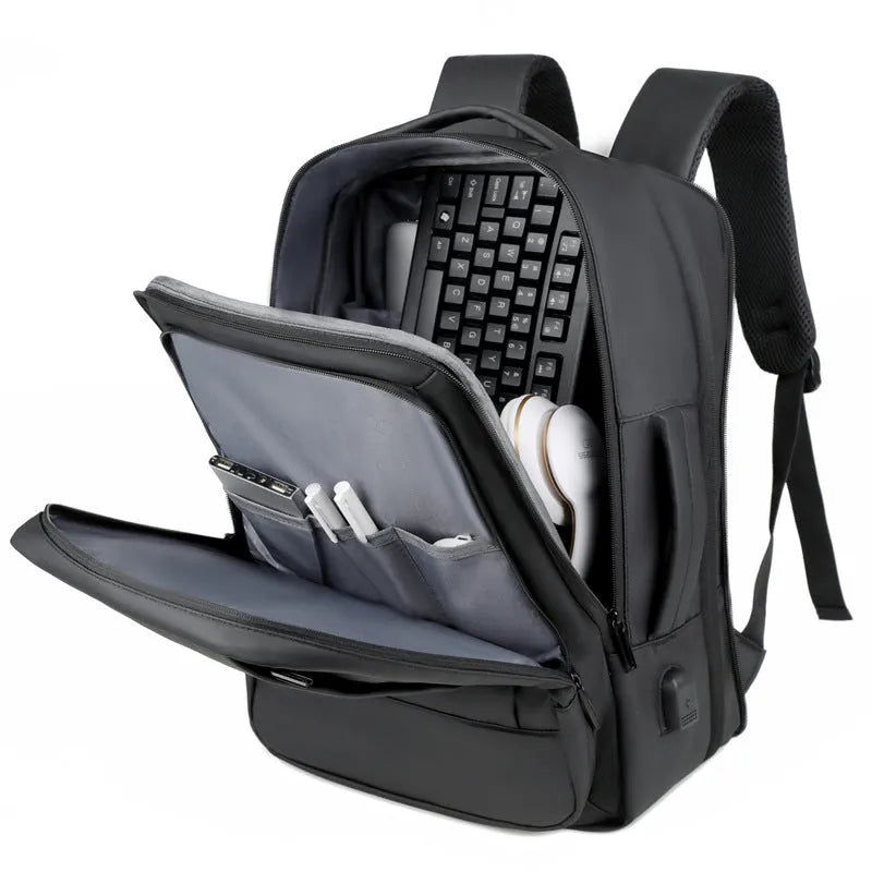 Black or grey waterproof Oxford cloth business travel backpack with curved shoulder strap and hand-carrying functionality