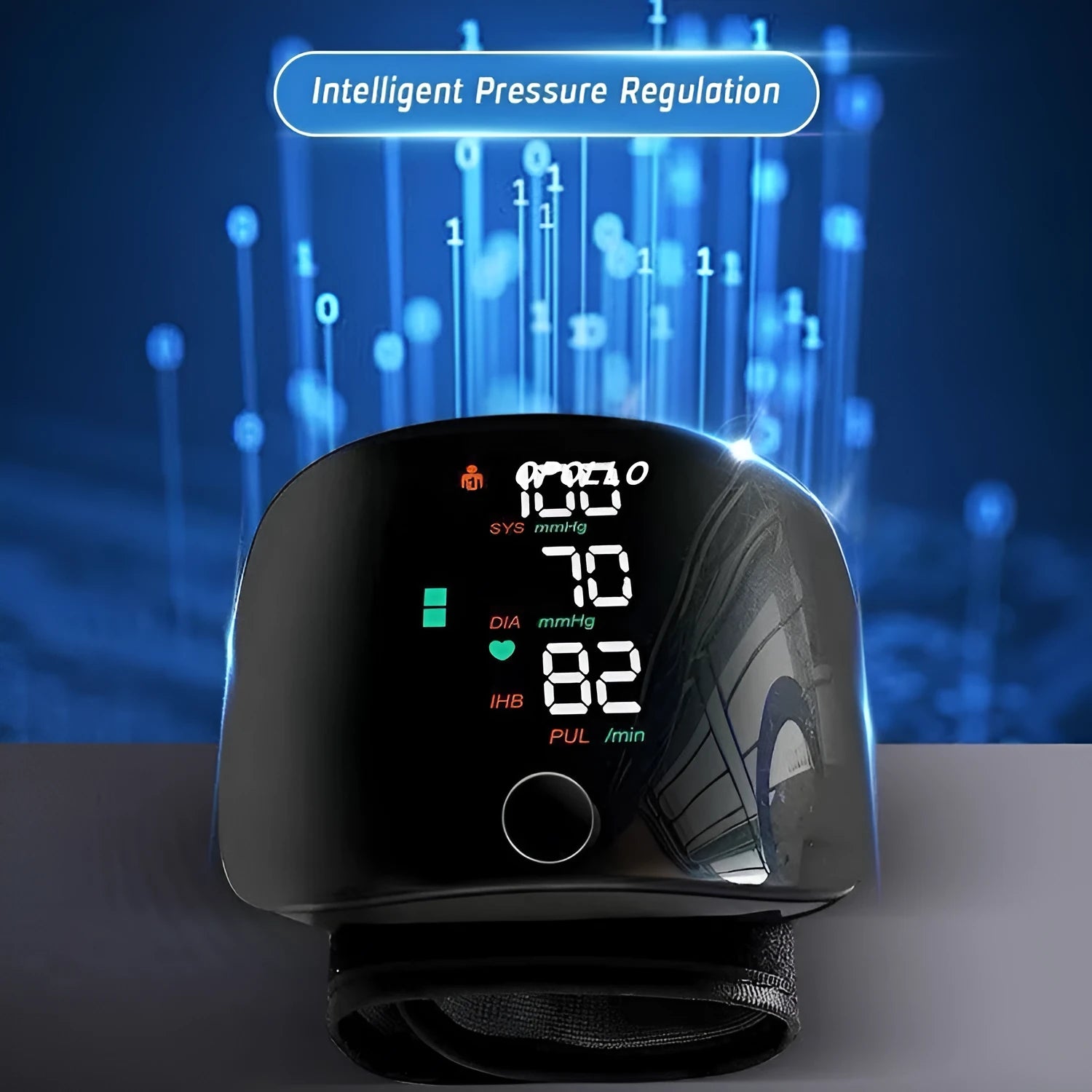 Black wrist blood pressure monitor with USB charging cable on a table.