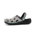 Black women's platform casual sandals with rhinestone detail on an EVA upper and sole.