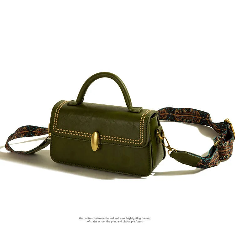 Brown vertical square messenger bag made of PU leather with a front sandwich pocket.