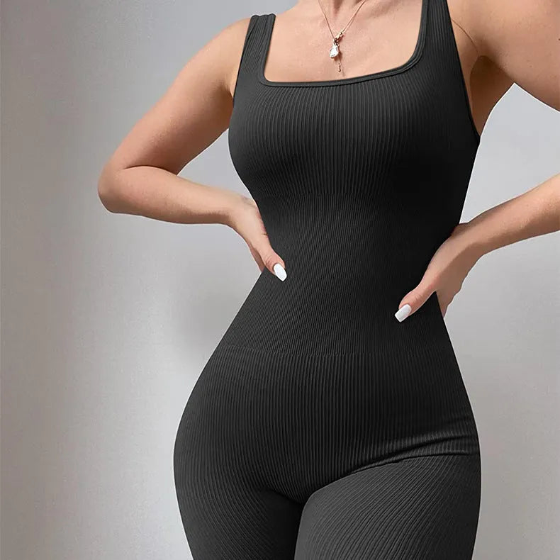 Women's long sleeve suspender tank top tights in spandex fabric on a hanger.