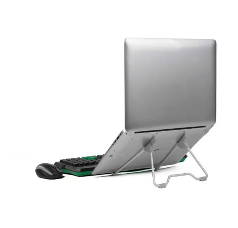 Grey aluminium alloy and plastic stand holding a mobile phone and a laptop.