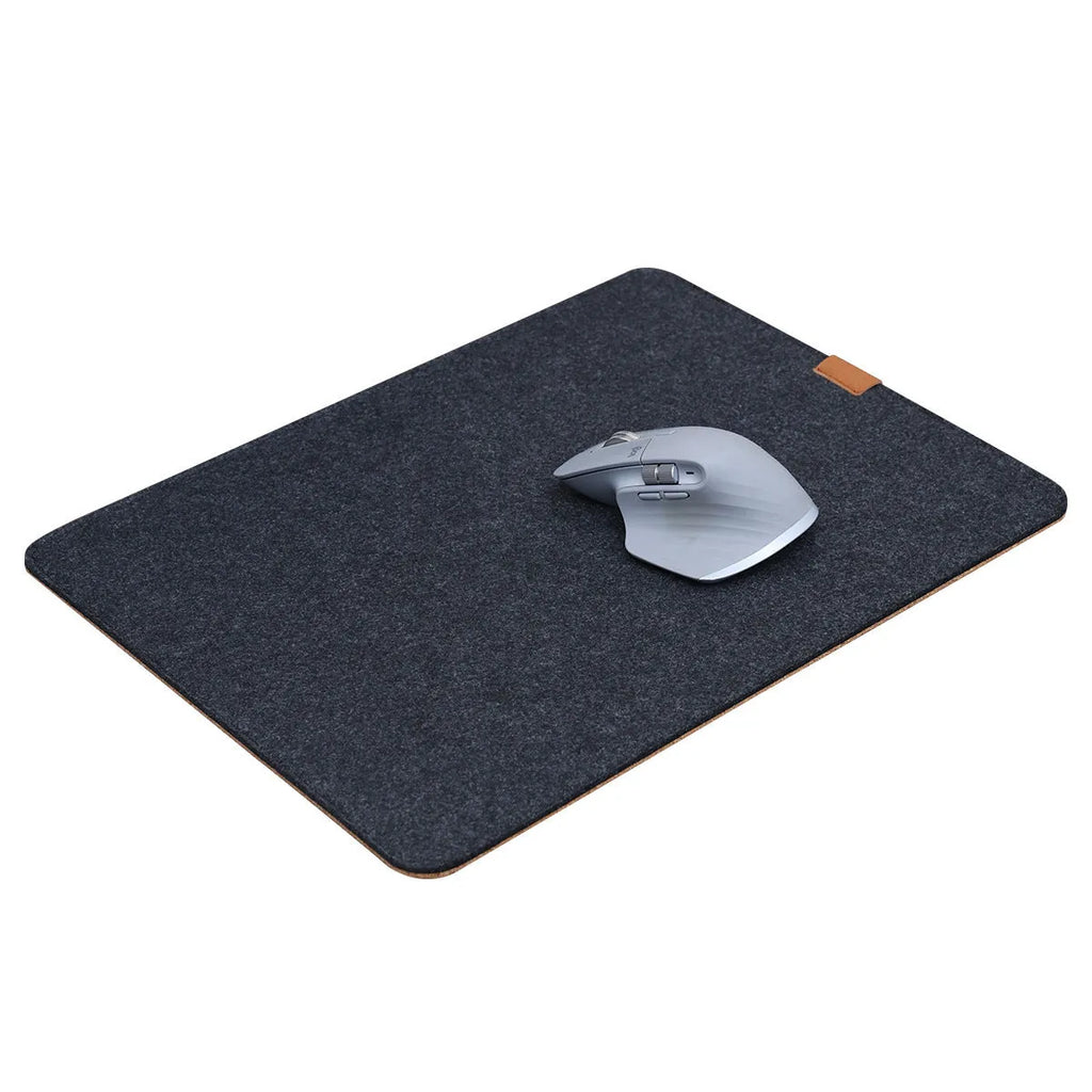 Felt cork desk mat in grey on a wooden desk, showing non-slip base and simple Japanese style design.