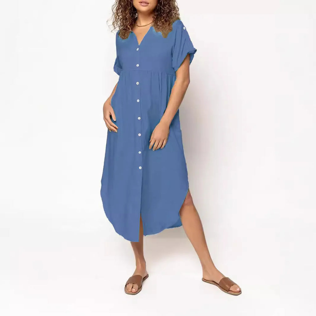 A loose-fitting, mid-length casual dress with a button-down front, shown in a solid colour.