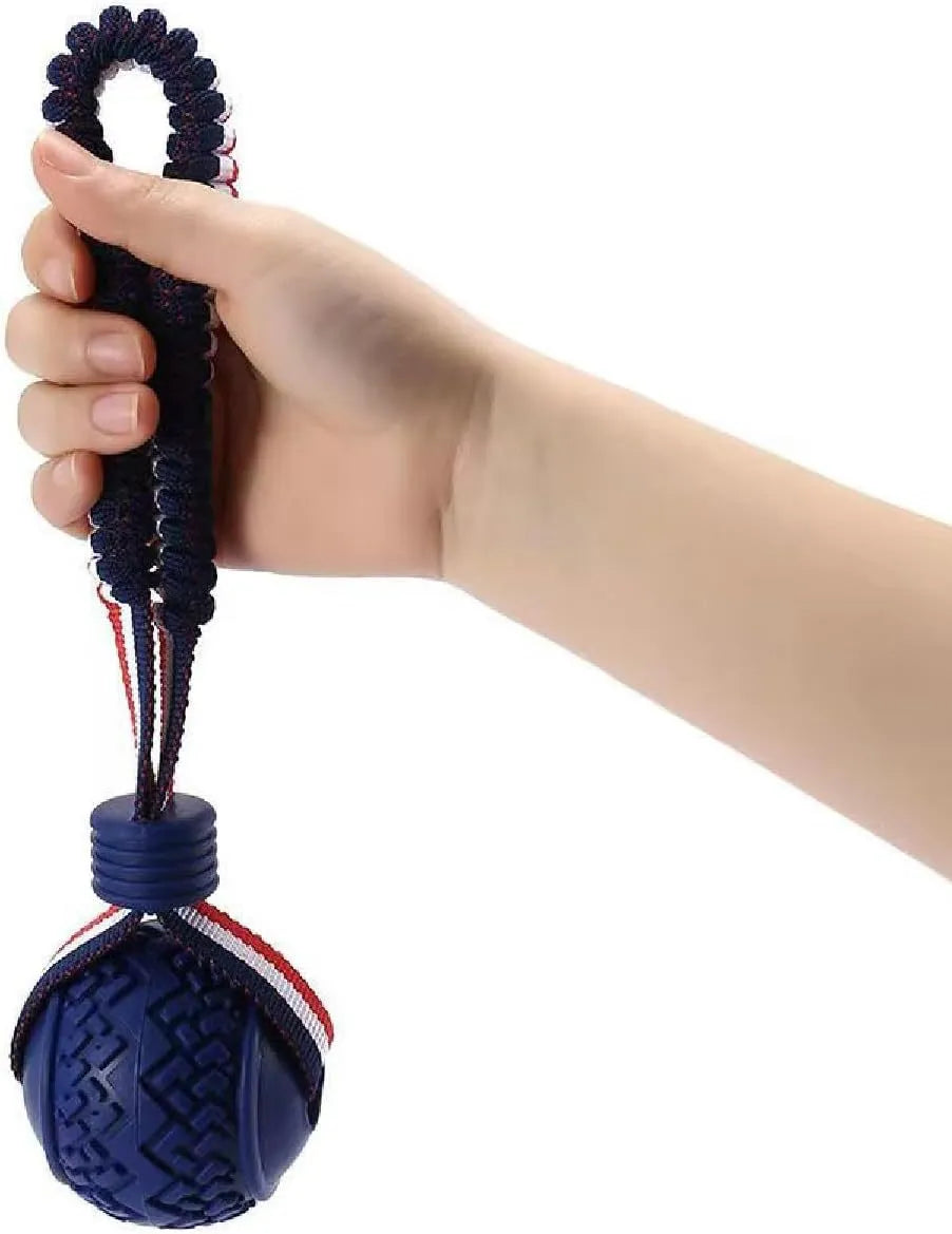 Blue natural rubber dog ball with rope attached, measuring 6.5cm in diameter