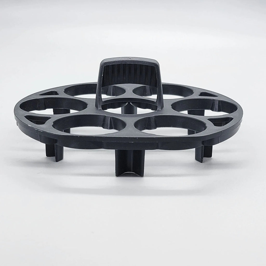 Black plastic egg holder rack with individual compartments measuring 13.8cm wide