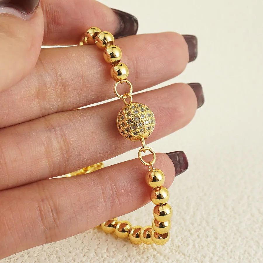 Women's copper bracelet with heart shape design and single zircon decorative element