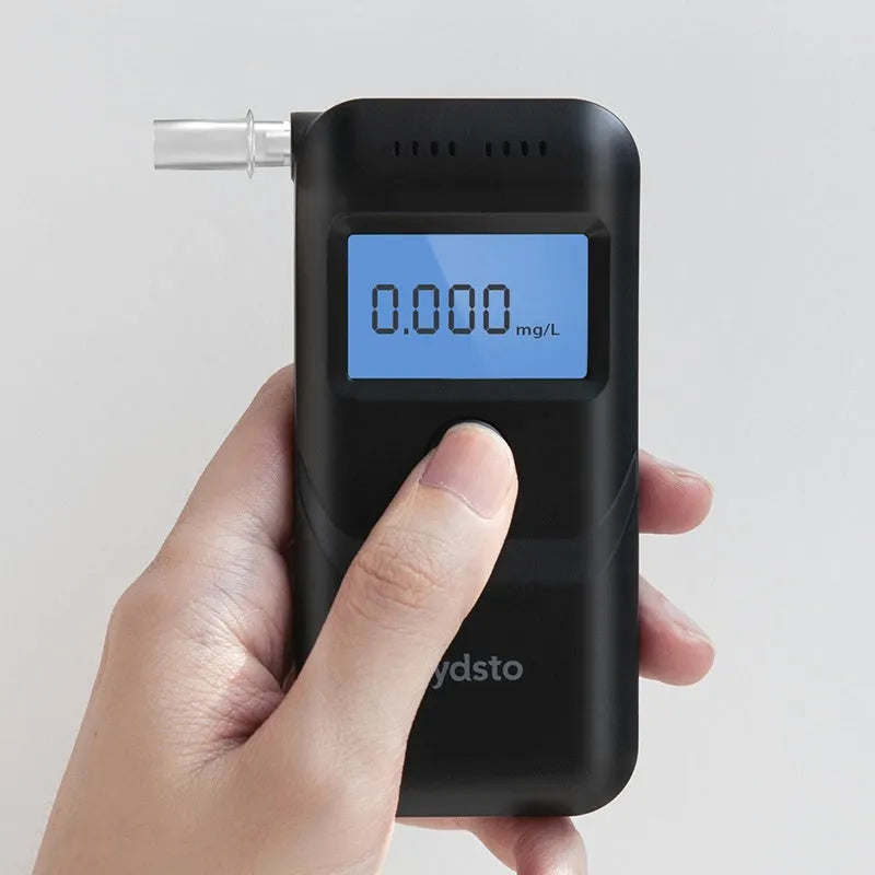 Black household alcohol breath tester with LED indicators, model HD-JJCSY01