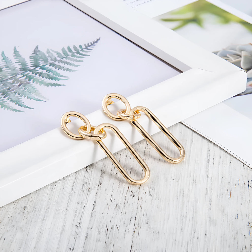 Geometric sterling silver needle hoop earrings with ring and line elements for women