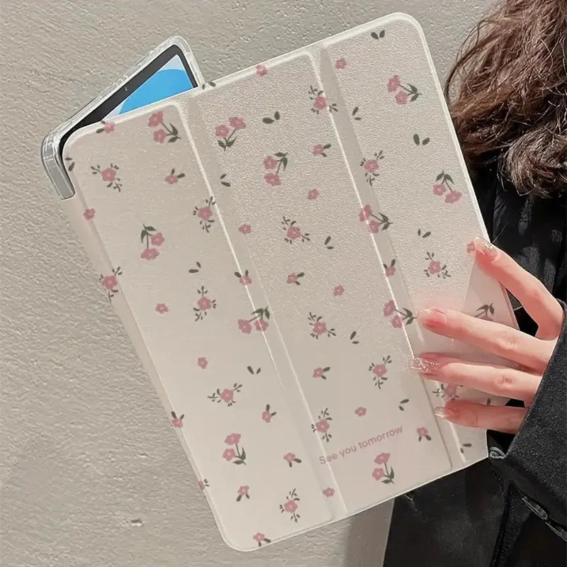 Transparent floral patterned tri-fold iPad case with magnetic stand function showing compatible tablet models