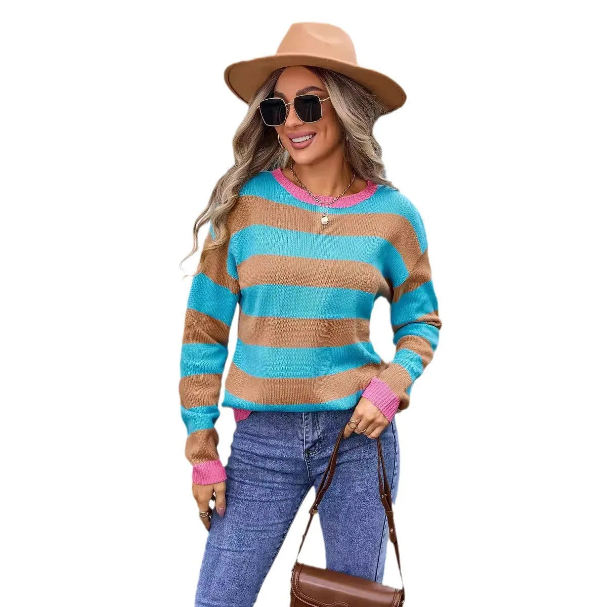 Women's loose blue striped acrylic long sleeve round neck sweater on a hanger