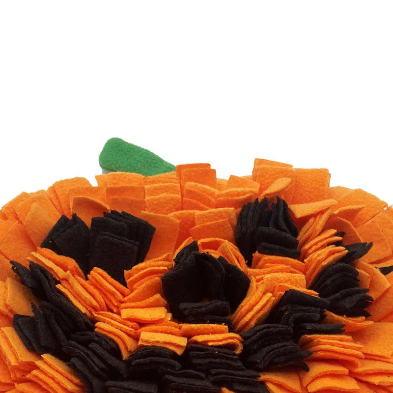 Orange pumpkin-shaped dog sniffing mat with soft fleece strips on a non-slip felt base