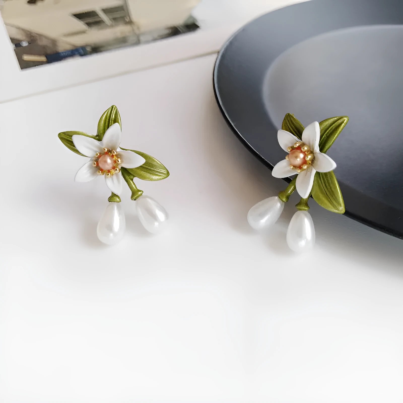 Women's camellia flower earrings in alloy with floral design and two colour options