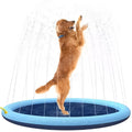 Blue anti-slip dog splash pad sprinkler toy with water sprays, placed on grass.