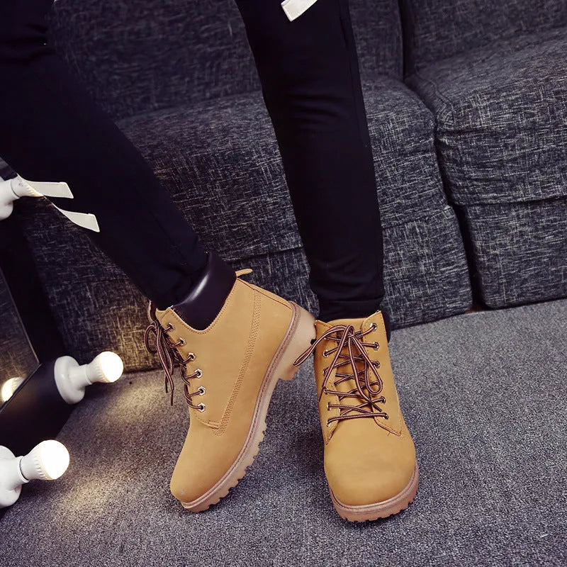 Pink men's Martin boots with velvet lining, flat heel, and front lace-up design