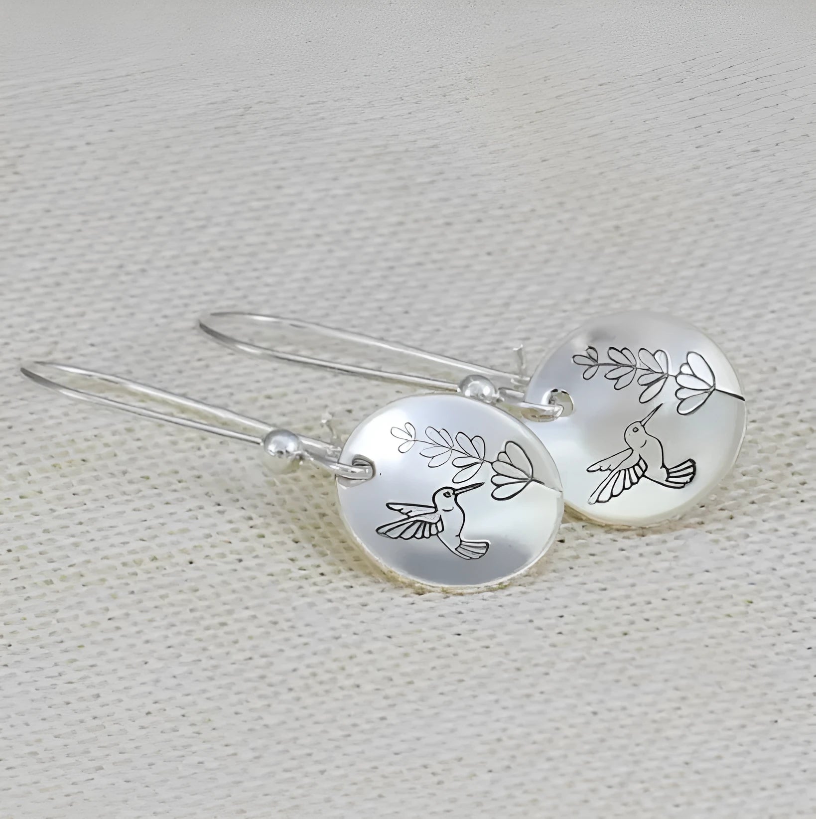 Silver retro bird flower women's earrings with leaf and animal zodiac elements on glossy round zinc alloy