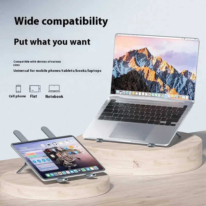 Silver aluminium laptop stand with twin cooling fans in folded position beside notebook computer