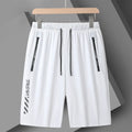 Men's quick-drying nylon sports shorts in loose fit with fifth length and medium elastic waistband