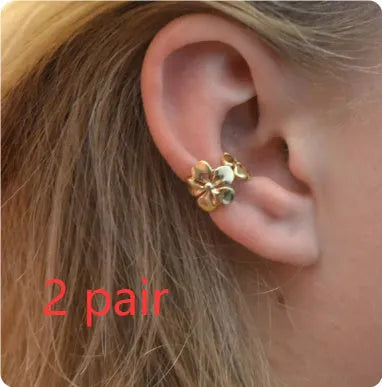 Gold starfish and conch shell drop earrings for women with animal zodiac design