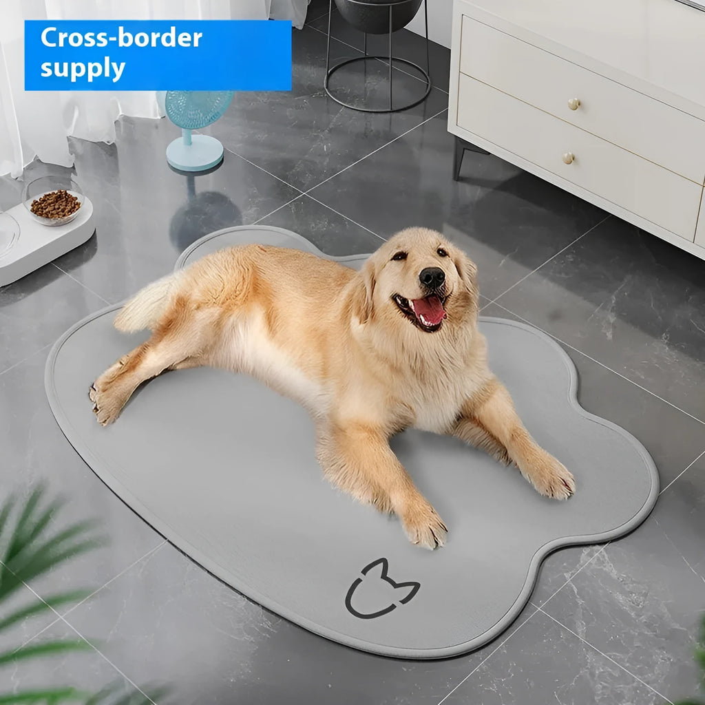 Ice silk dog cooling mat with dog head shaped design in light grey on a wooden floor.