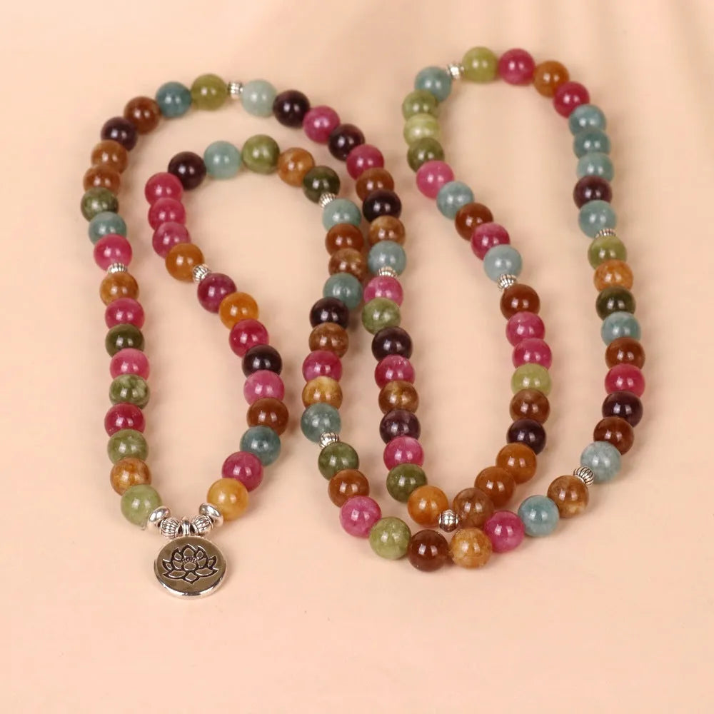 Multi-strand tourmaline bead bracelet with lotus clasp showing 108 beads on alloy chain