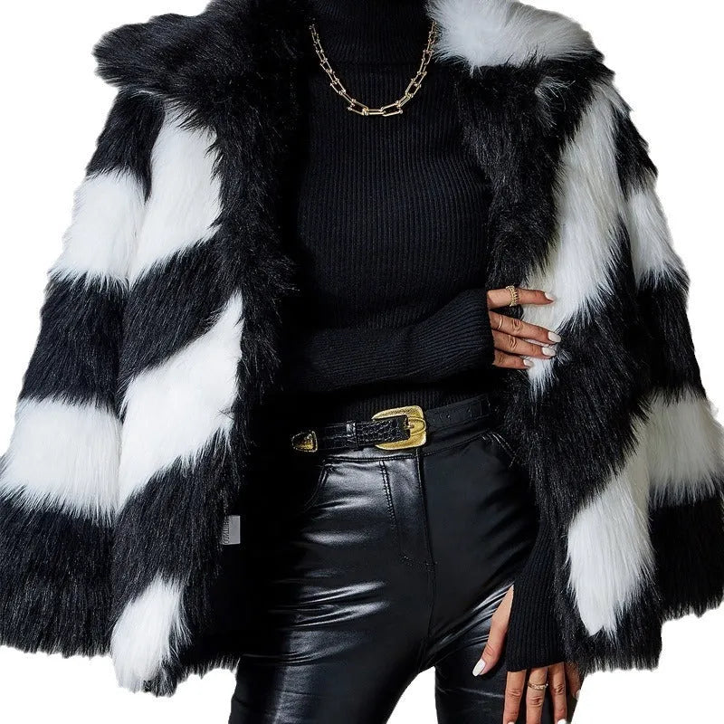 Women's faux fur coat with a contrasting colour lapel and a large fur collar.