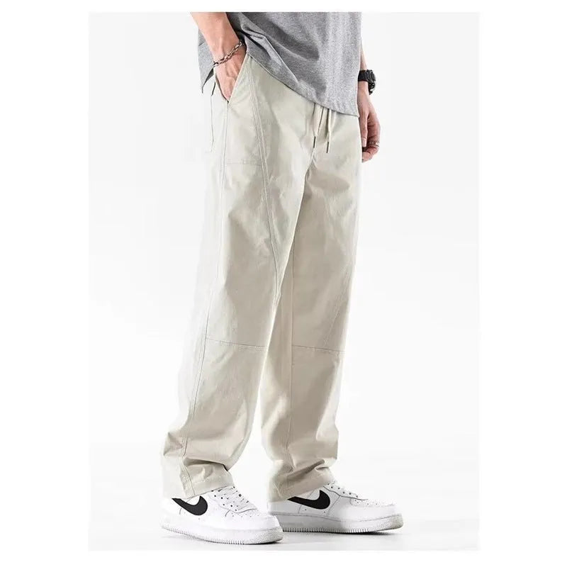 Milky white wide-leg antibacterial cotton trousers shown flat lay