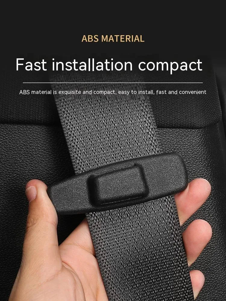 Two black ABS car safety belt stopper universal clips for seat belt adjustment, supplied in OPP bag