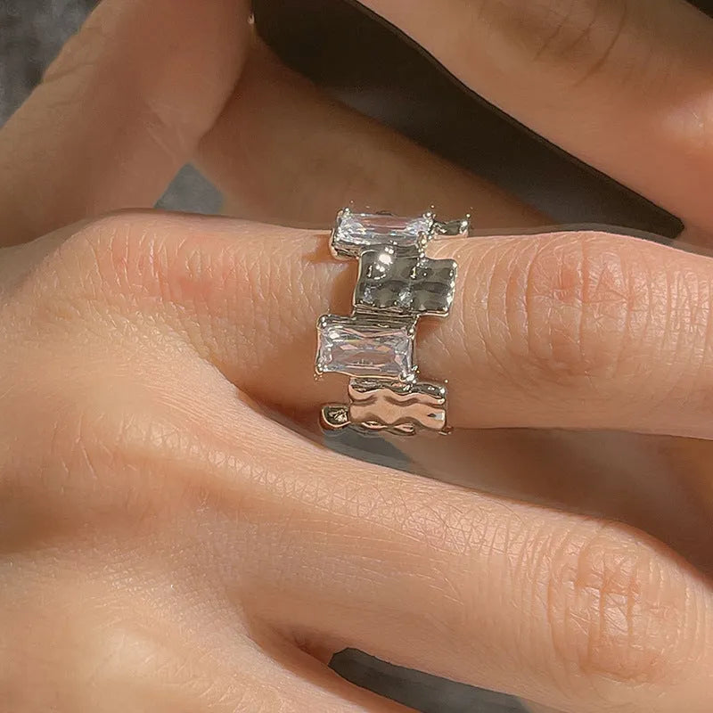 Open geometric silver ring with cross zircon pattern in retro style